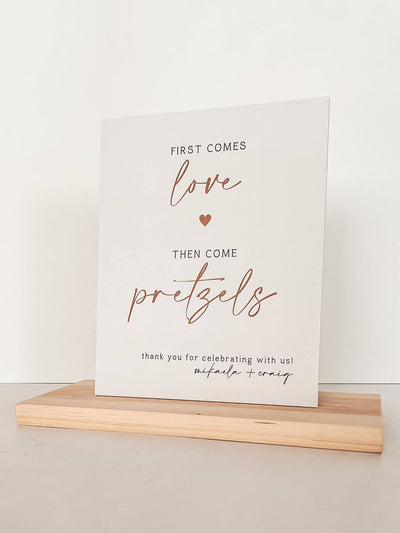 first comes love then come pretzels wedding sign